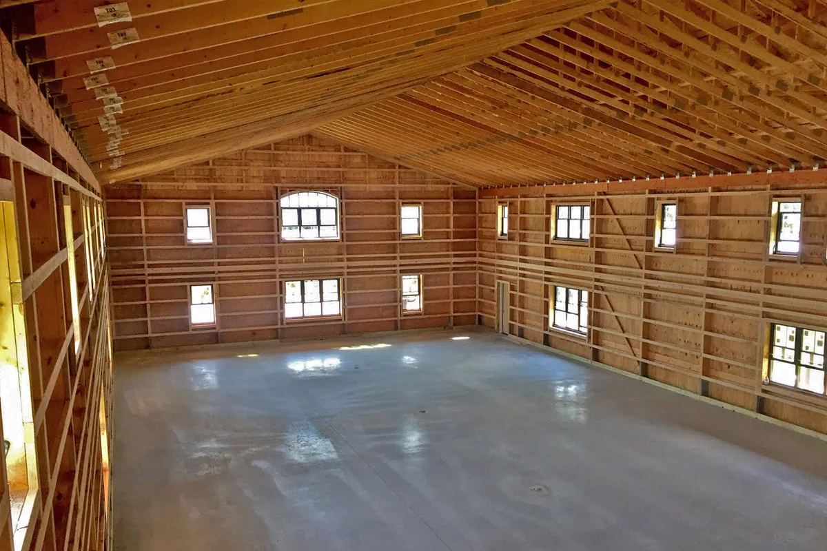 barndominium interior shop with high ceiling
