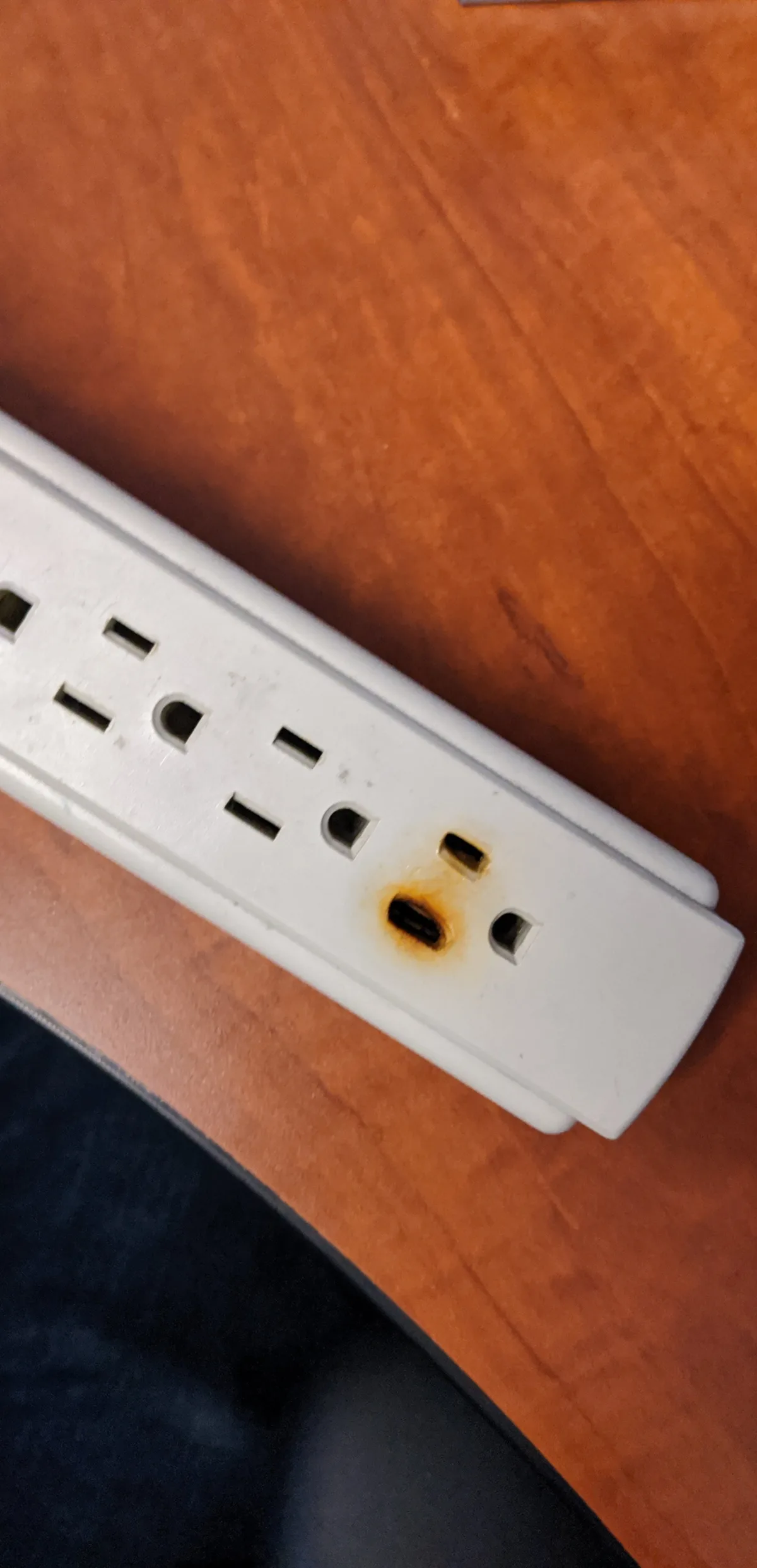 overloaded daisy-chained power strip